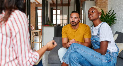 Couple Talking With A Counselor