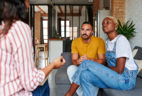 Couple Talking With A Counselor